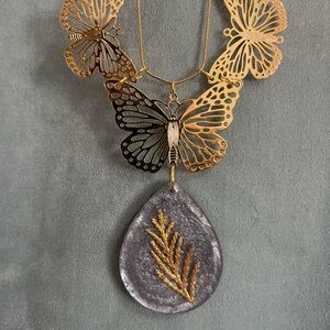 Elegant Gold and Silver Butterfly Necklace